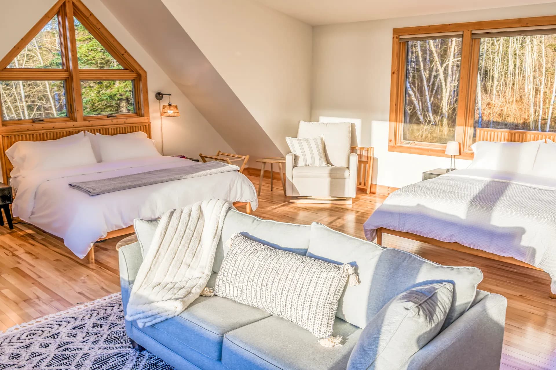 Bedroom 1 — king, queen & sofa bed, surrounded by views