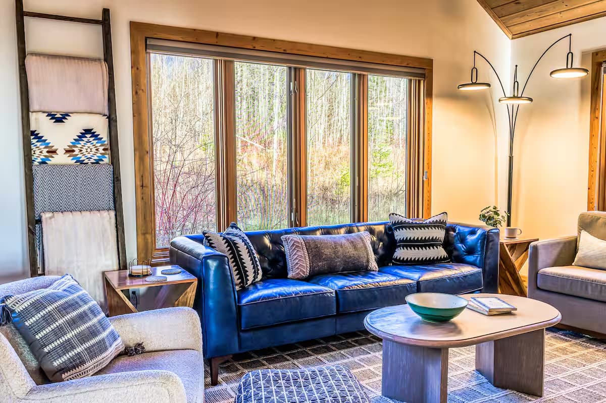 Living area — gas fireplace, walls of windows
